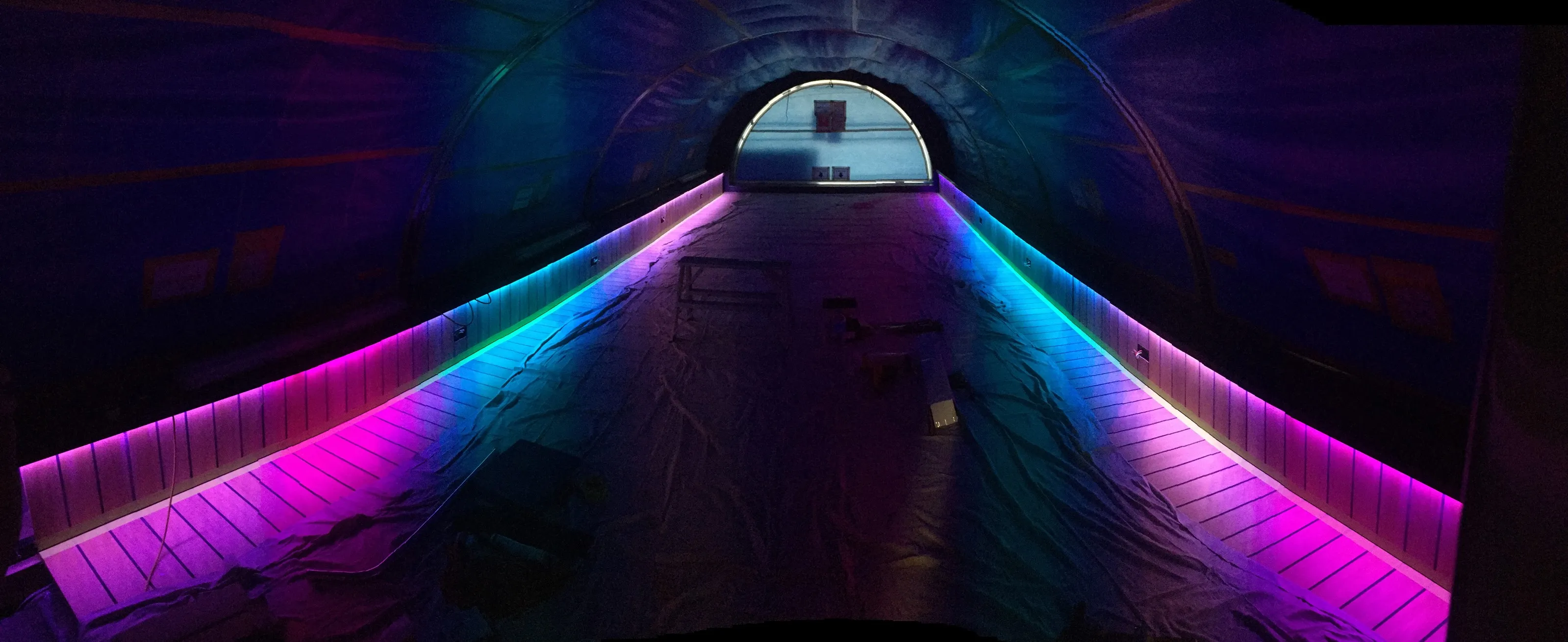 Architectural LED feature lighting in a tunnel walkway, installed by Best Forsyth Electrical